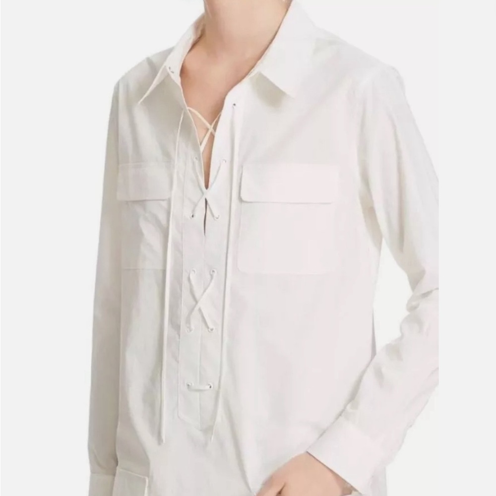 Short, crisp, white dress. Equipment Femme.